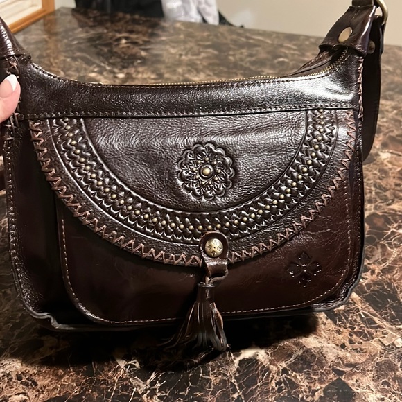 Patricia Nash Handbags - Patricia Nash crossbody purse. With 4 compartments.